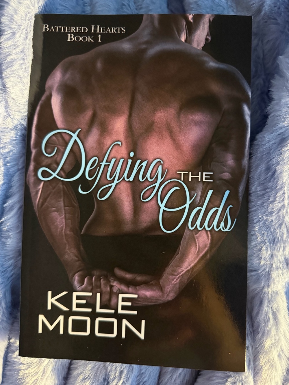 Defying the Odds Book by Kele Moon